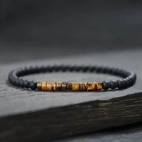 Pulsera Protección y Prosperidad (Ónix - ojo de tigre)