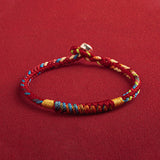 Pulsera Tibetana de Cuerda Roja