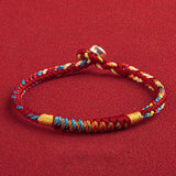 Pulsera Tibetana de Cuerda Roja