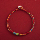Pulsera Tibetana de Cuerda Roja